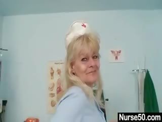 Aged Blond lady shows Off Natural Tits And Dildo Skills