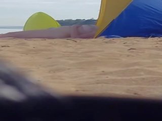 Alluring milf spied at beach (please comment)